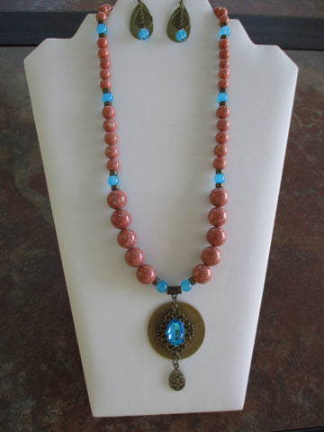 Tan, Blue Glass Beads Bronze Beads Bronze Circle with Blue Bling Pendant Necklace Earring Set (NE557)